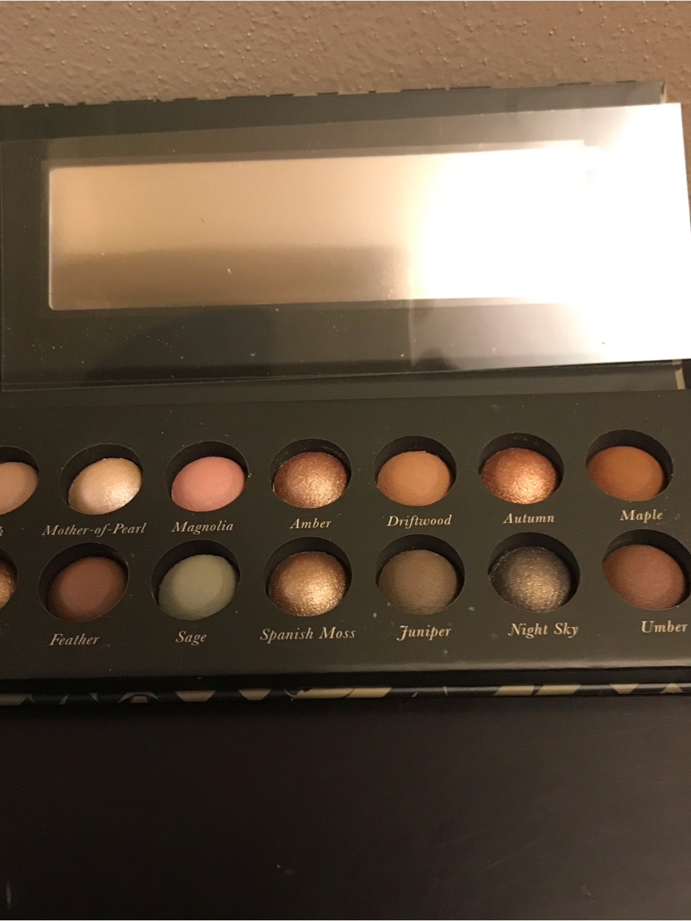 Laura Geller baked eyeshadow palette earthy essentials.